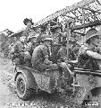 BALIKPAPAN AREA, BORNEO. 1945-08-15. MEMBERS OF A PATROL FROM 13TH PLATOON, C COMPANY, 2_9TH INFANTRY BATTALION IN JEEP AND TRAILER