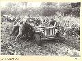 BOUGAINVILLE ISLAND. 1945-03-01. A BOGGED JEEP AND TRAILER OF THE 7TH INFANTRY BATTALION