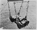 New River area, North Carolina. Jeep being lowered from a transport ship to Higgins boat during a First Division landing operation 1941 Apr. Bantam BRC 40.