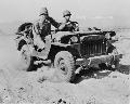 Indio, California.A Willys MA jeep rolling over the desert at the desert training center, June 1942.