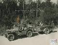 20302703-S Willys MB 66th Reg 71st Div., A U.S. Army jeep drawing drinking water from a tank that had been chlorinated at Fort Benning on 11 October 1944