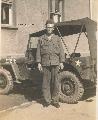 20339193 MB 1945 322nd Engineers, soldier with jeep, top up Germany