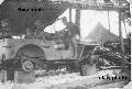 20472144 MB, 1944 Netherlands Dutch Soldiers in jeep on blocks. Morotai