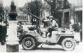 20516267-S GPW A recon jeep from Task Force Bacon, 95th Infantry Division in the street Franois de Curel