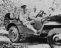 2046528 MB Major General Alexander Patch Commander of the US Forces in New Caledonia, with Colonel Howard F Fuller (driving)  1 January 1943. Paul Popper/Popperfoto
