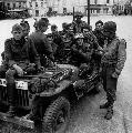 20351668-S MB Cherbourg. June 28th, 1944. American Military Police with German prisoners of war. Robert Capa photo