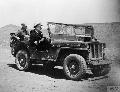 20385072-S GPW, Rear Admiral Scott-Moncrieff, uses an American Army jeep to travel around the West Korean island.