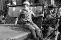 Budapest, 1945. mjus 9. Egy szovjet katonai terepjr motorhzn l egy pesti kisfi a bketntetsen. MTI Fot/MAFIRT